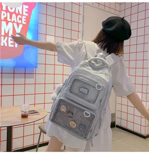 Casual large capacity student school backpack with transparent ita bag design and cute badges.