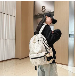 American retro large-capacity casual backpack with stylish print and cute plush pendant