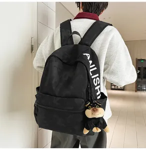 Casual large capacity black backpack with stylish letter print, perfect for daily use and school.