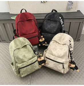 Detailed view of casual vintage large capacity canvas backpacks in four colors with cute pendants.