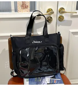 Detail view of Japanese style black ita bag with clear window, canvas shoulder crossbody bag.