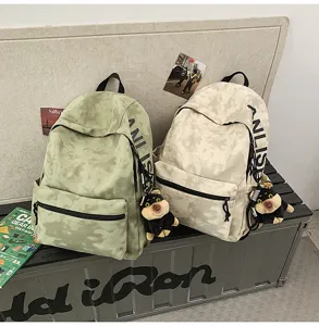 Vintage large capacity casual backpack stylish printed school bag with cute dog pendant.