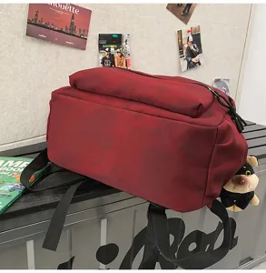 Vintage large capacity casual backpack school bag with cute doll pendant for outdoor daily use