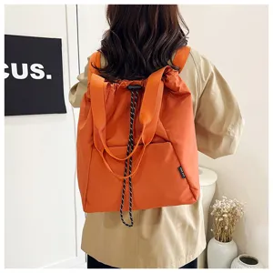Orange drawstring backpack casual daypack large capacity multi-function shoulder tote bag