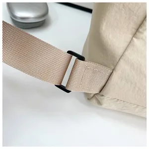 Nylon backpack strap detail, adjustable buckle close-up view, durable casual daily accessory.