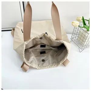 Beige canvas convertible backpack drawstring shoulder bag multi-pocket casual daily handbag