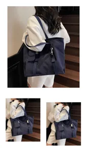 Large capacity blue canvas tote bag, casual shoulder bag with buckle details for daily commuting.