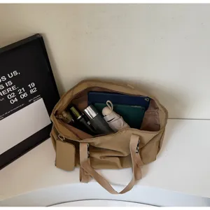 Spacious casual khaki nylon tote bag with inner compartments for daily commuting and shopping.