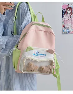 Vista detallada de la bonita mochila estilo universitario rosa y verde con bolsillo transparente.