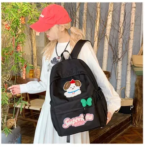 Casual black backpack for women, Japanese style large capacity school bag with cute puppy patch.