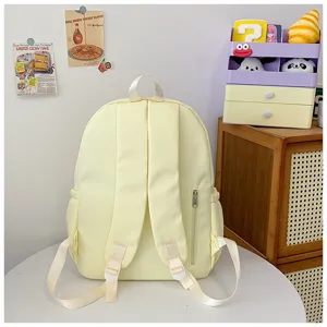 Cute yellow canvas backpack for women, casual simple lightweight daily school daypack bag.