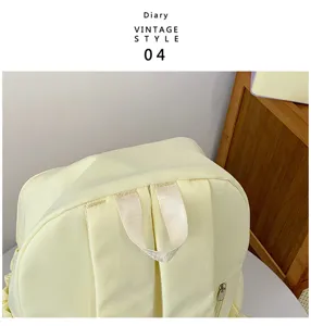 Light yellow casual backpack top view, showing adjustable shoulder straps and top handle detail.