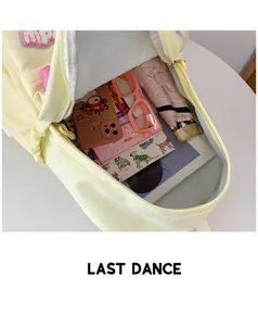Casual yellow canvas backpack for daily commuting, lightweight and spacious storage bag.