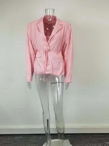 Pink belted blazer jacket detail, elegant summer office wear design, stylish lapel collar style.