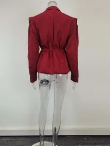 Back view detail of the elegant dark red women's blazer jacket showing the belt and tailored cut.