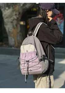 Casual outdoor travel backpack for women, lightweight hiking daypack with large capacity for sports.