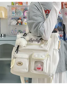 Japanese style sweet messenger bag student canvas shoulder bag with cute plush bear pendant.