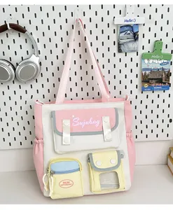 Japanese style pink canvas tote bag, cute student shoulder bag with multi pockets for daily commute.