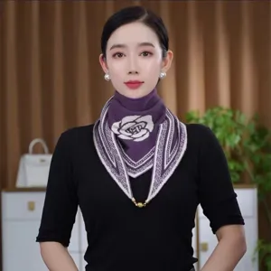 Stylish knitted triangular scarf for women, featuring a cozy two-color design and magnetic clasp.