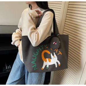 Large capacity canvas shoulder bag for women, casual commuter tote with cute cat print.