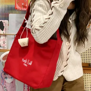 Japanischer Canvas Shopper mit Buchstaben Stickerei, lässige Damen Schultertasche Alltag