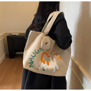 Large capacity canvas tote bag for women, casual cute cat print shoulder bag for daily use.