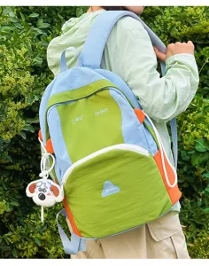 Detailed view of the cute colorblock backpack, large capacity school bag for students.