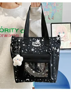 Japanischer Ins-Stil schwarze Sternen-Segeltuchtasche mit transparenter Vordertasche und Anhänger.