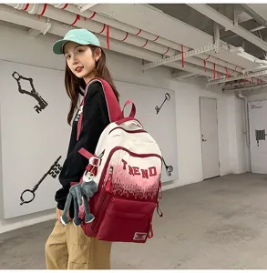 Sac à dos en toile dégradé tendance, cartable casual élégant pour voyage et quotidien.
