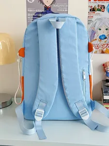 Cute color-blocking backpack for women and students, large capacity travel school bag.