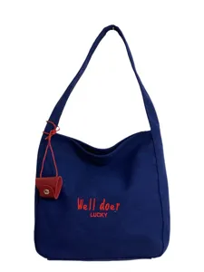Canvas Schultertasche mit roter Buchstabenstickerei für Damen Alltag Pendeln und Schule.