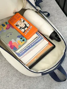 Sac à dos esthétique minimaliste de grande capacité avec design bicolore élégant.