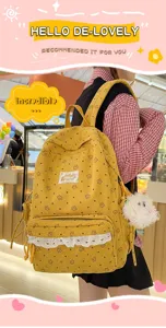 Korean style cute corduroy school backpack for girls, yellow floral design with lace trim and pendant.