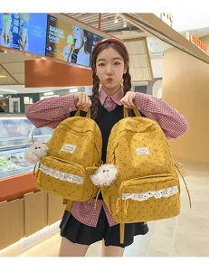 Korean style cute student backpack, fresh corduroy casual school bag for girls travel shopping.