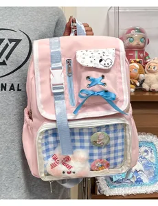 Cute kawaii ita backpack for teen girls, pink lolita school bag with clear window and bows.