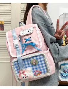 Cute Japanese ita backpack for students, pink canvas school bag with clear window, casual style.