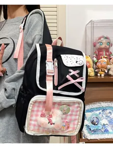 Cute Japanese style ita backpack with clear window and pink bow, ideal for school and daily wear.