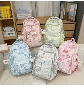 Casual student backpack with Chinese style bamboo leaf print, large capacity multi-pocket design.
