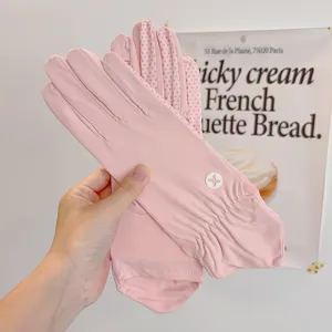 Summer pink ice silk sun protection gloves detail showing anti-slip silicone dots design.