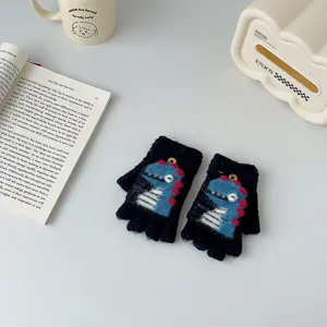Detailed shot of cute cartoon dinosaur kids knit half-finger flip gloves cozy winter wear.