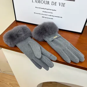 Grey winter warm gloves detail, plush faux fur cuff, soft fleece lining for cold weather.