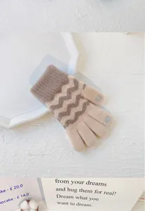Women winter warm knitted gloves with wave pattern and touch screen fingertips for cold weather.
