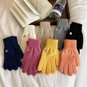 Colorful knitted wool gloves with cute bear embroidery, perfect winter warm touch screen style.