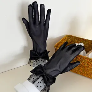 Black mesh lace gloves featuring bowknot and polka dots, perfect for summer sun protection.