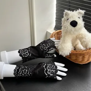 Black lace fingerless gloves for women, elegant floral mesh design for dance and party use.