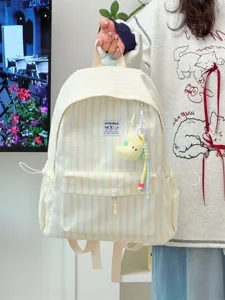 Japanese style casual striped canvas backpack with cute pendant for women student daily use.