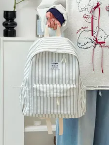 Japanese minimalist striped backpack for women, large capacity casual daily student school bag.