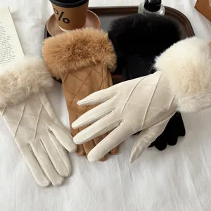 Detail view of women's winter warm suede gloves featuring plush faux fur cuffs and quilted design.