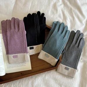 Detailed view of women's thermal fleece touch screen gloves in multiple colors with contrast color cuffs.