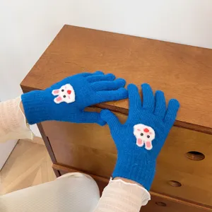 Cute blue winter knit gloves for women featuring a sweet white rabbit applique. Warm and cozy.